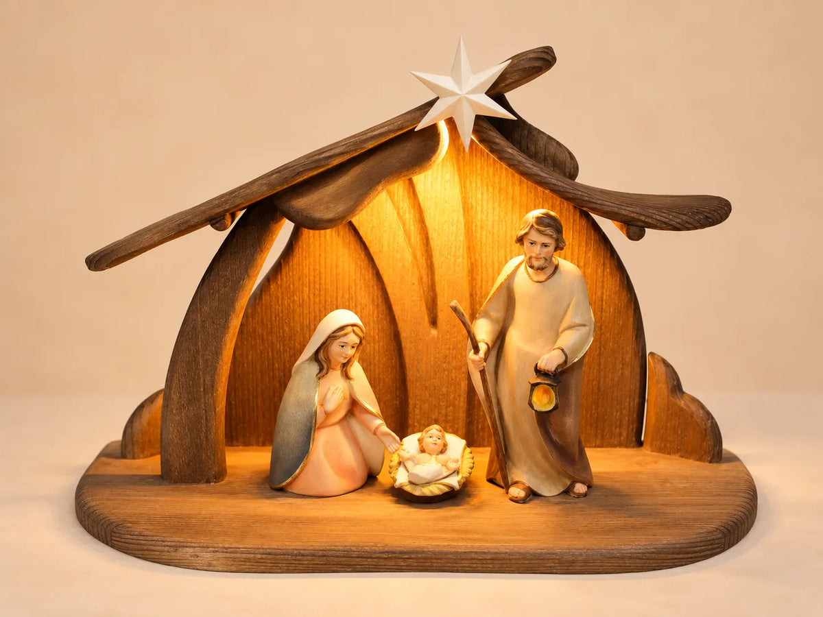 Komet Krippenset Hl.Familie fuersorgend_5-teilig_mit Familienstall PEMA-Format43