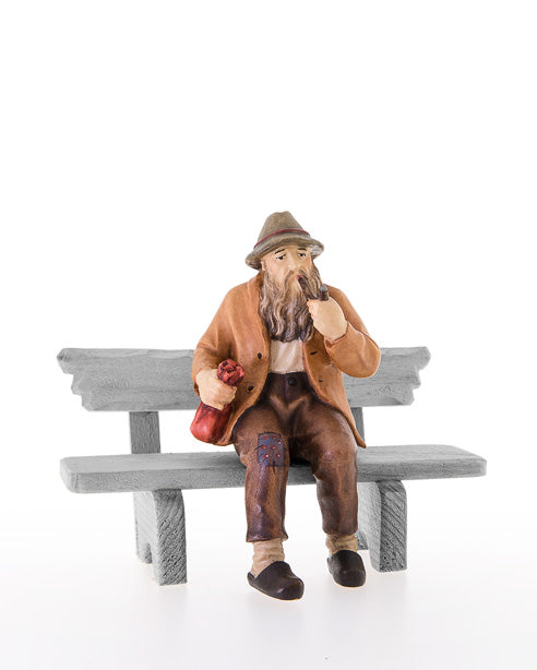 Sitzender Mann ohne Bank