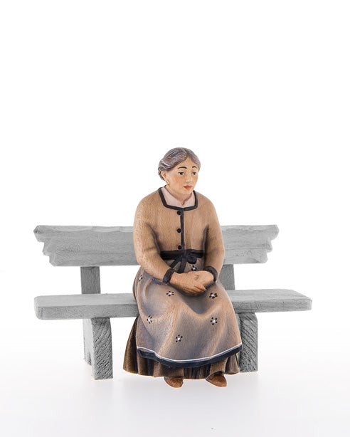 Sitzende Frau ohne Bank
