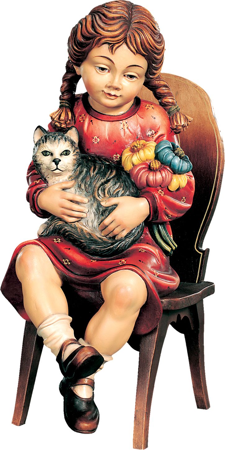 Mädchen sitzend mit Katze auf Stuhl
