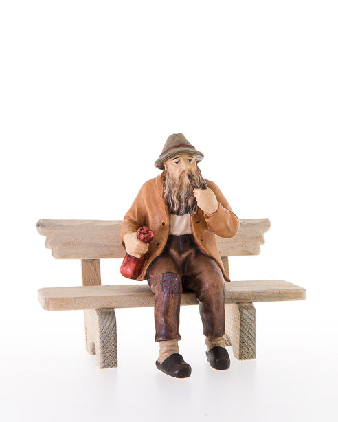 Sitzender Mann mit Bank
