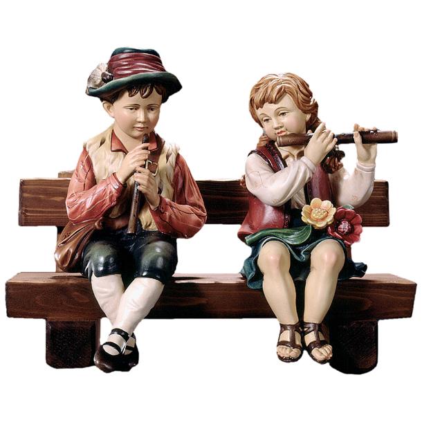 Flötenspieler und Querflötenspielerin auf Bank - bemalt